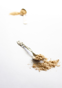 texture shot of Seatrients sea moss blends on vintage spoons on a light white background.